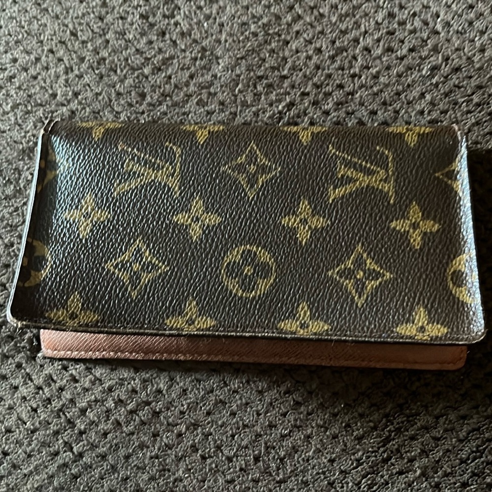 a genuine Louis Vuitton checkbook cover